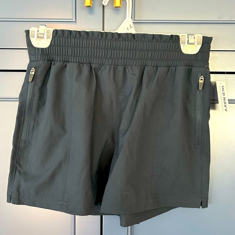 NWT. Old Navy girls large (10-12) HR, keep you dry, running shorts.